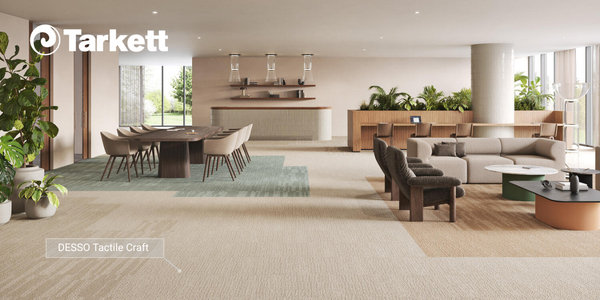 Volgens Tarkett zijn interieurs die warmte en rust uitstralen de trend in 2026. Tarkett Desso Evolve Emerge Banner